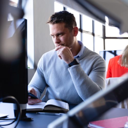Caucasian man working in office